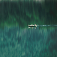 people in boat on water